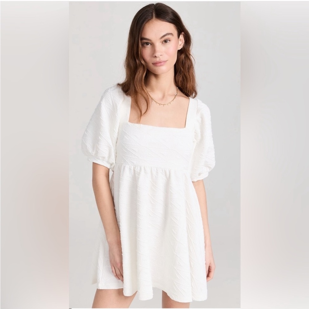 Free People Babydoll Dress with puffy sleeves and pockets !